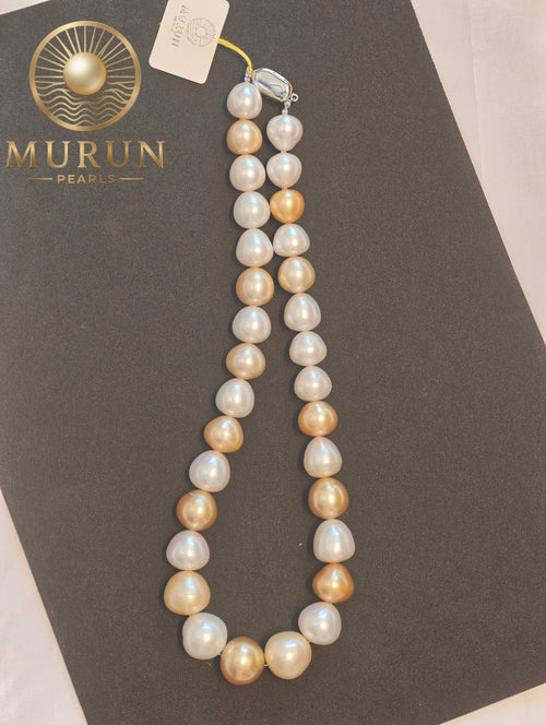 Experience the elegance of natural luxury with our Golden & White South Sea Pearl Necklace.
