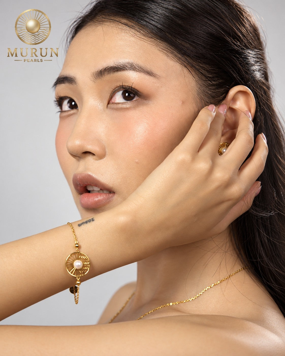 Murun Pearls Limited Edition emblem bracelet and stud earring with white cultured pearls